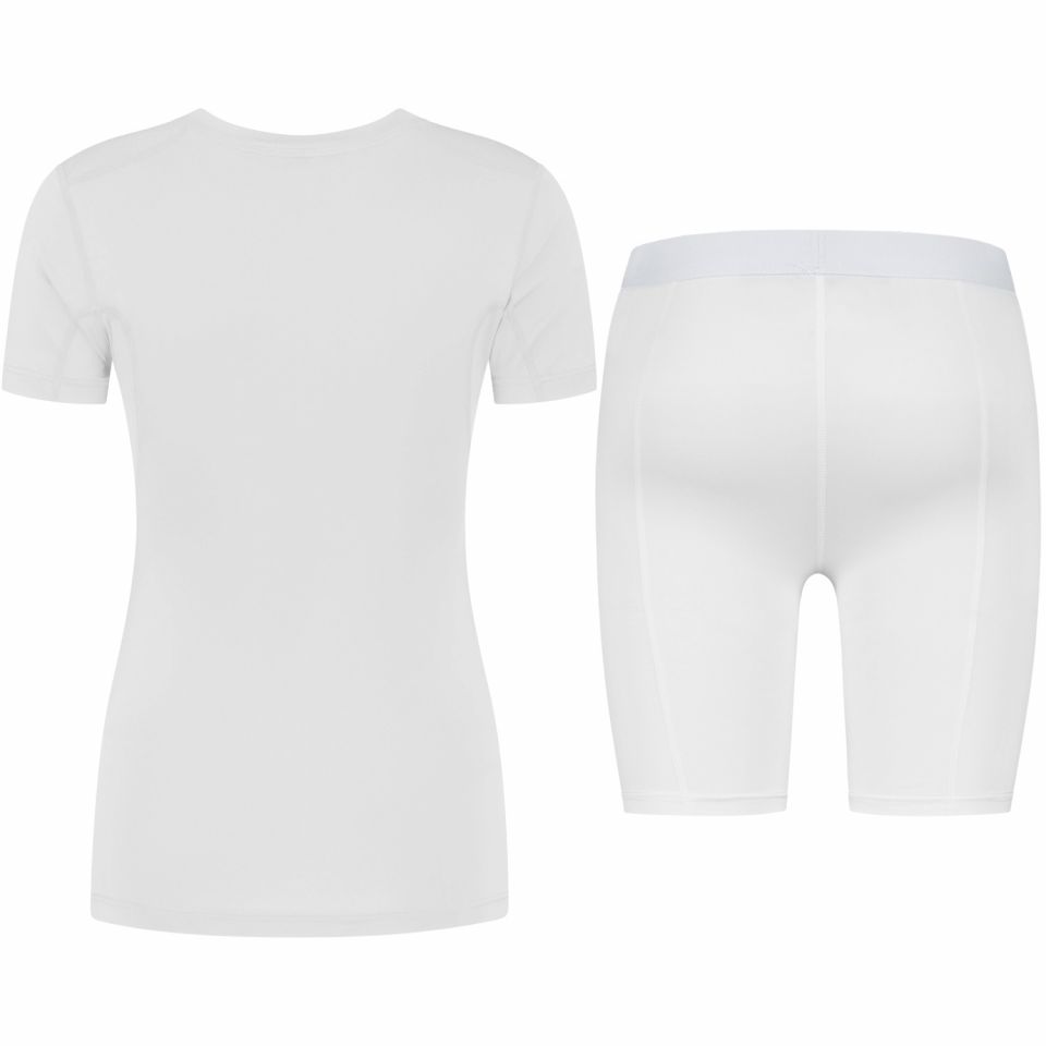 gladiator sports pakket compressiebroek en shirt dames in wit van achteren gefotografeerd